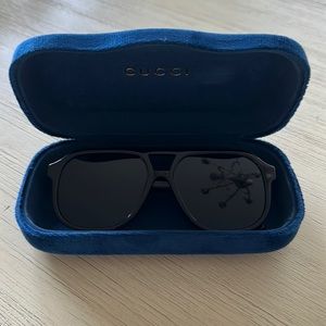 Gucci black with gold accent sunglasses